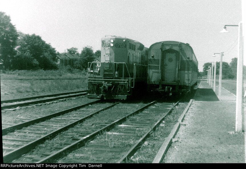 PNCX 1702 runs around his train for the return trip.